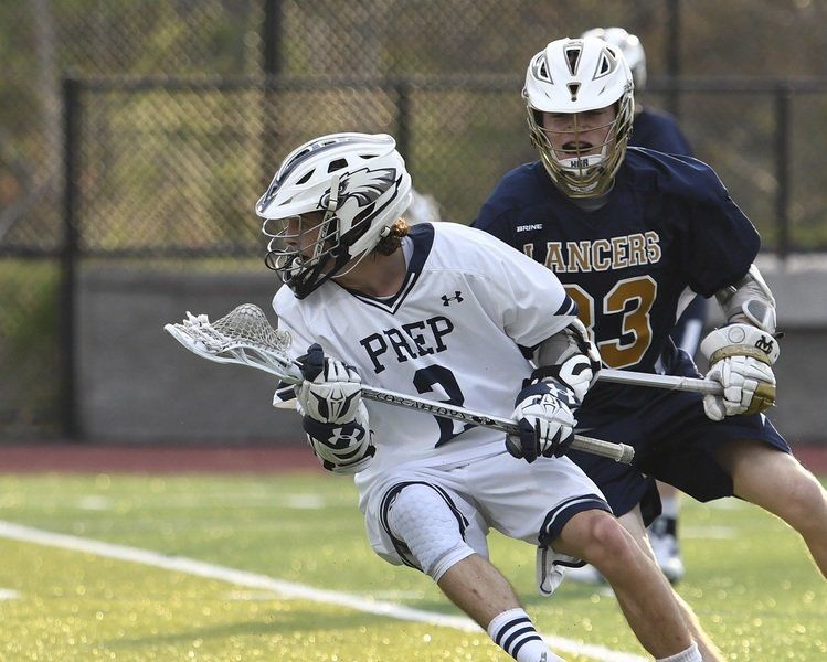 Prep lax squad handles MC, climbs over .500